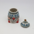 Ceramic container Gnome Christmas tree with lid A523 D62 – hand-painted Bolesławiec pottery in the shape of a gnome and Christmas tree, decorative and practical for storing small items or sweets.