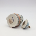 Ceramic container Gnome Christmas tree with lid A523 D62 – hand-painted Bolesławiec pottery in the shape of a gnome and Christmas tree, decorative and practical for storing small items or sweets.
