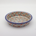 Okrągłe ceramiczne naczynie do zapiekania z Bolesławca, ręcznie zdobiona ceramika bolesławiecka, polskie rękodzieło artystyczne do piekarnika, mikrofalówki i zmywarki.