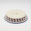 Okrągłe ceramiczne naczynie do zapiekania z Bolesławca, ręcznie zdobiona ceramika bolesławiecka, polskie rękodzieło artystyczne do piekarnika, mikrofalówki i zmywarki.
