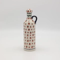 Hand-painted striped teapot made from traditional Bolesławiec pottery. A stylish and functional piece perfect for serving tea and decorating the kitchen.