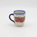Hand-painted BEL mug made from traditional Bolesławiec pottery. A stylish mug perfect for coffee, tea, and everyday use.