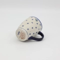 Hand-painted BEL mug made from traditional Bolesławiec pottery. A stylish mug perfect for coffee, tea, and everyday use.