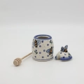 Hand-painted honey pot made from traditional Bolesławiec pottery. A stylish and practical container perfect for storing and serving honey.