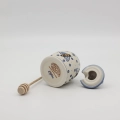 Hand-painted honey pot made from traditional Bolesławiec pottery. A stylish and practical container perfect for storing and serving honey.