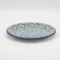 Elevate your dining experience with the ANDY collection dinner plate. This 26 cm flat plate is a centerpiece of any tableware set, merging centuries of Bolesławiec pottery tradition with premium craftsmanship.