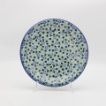 Elevate your dining experience with the ANDY collection dinner plate. This 26 cm flat plate is a centerpiece of any tableware set, merging centuries of Bolesławiec pottery tradition with premium craftsmanship.
