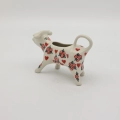 The 100 ml capacity is perfectly measured for serving cream or milk for several people, while the precisely shaped cow's mouth allows for easy pouring without spilling a drop on the tablecloth.