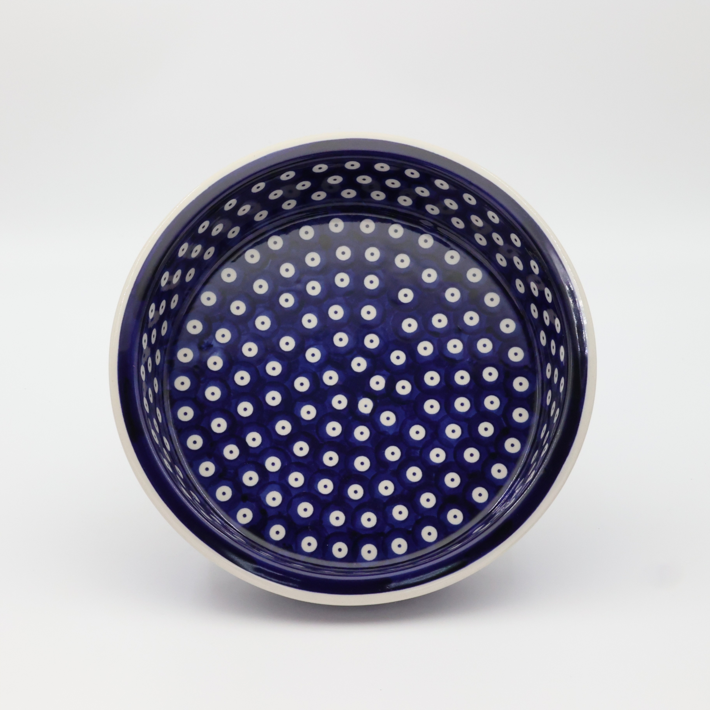 Okrągłe ceramiczne naczynie do zapiekania z Bolesławca, ręcznie zdobiona ceramika bolesławiecka, polskie rękodzieło artystyczne do piekarnika, mikrofalówki i zmywarki.