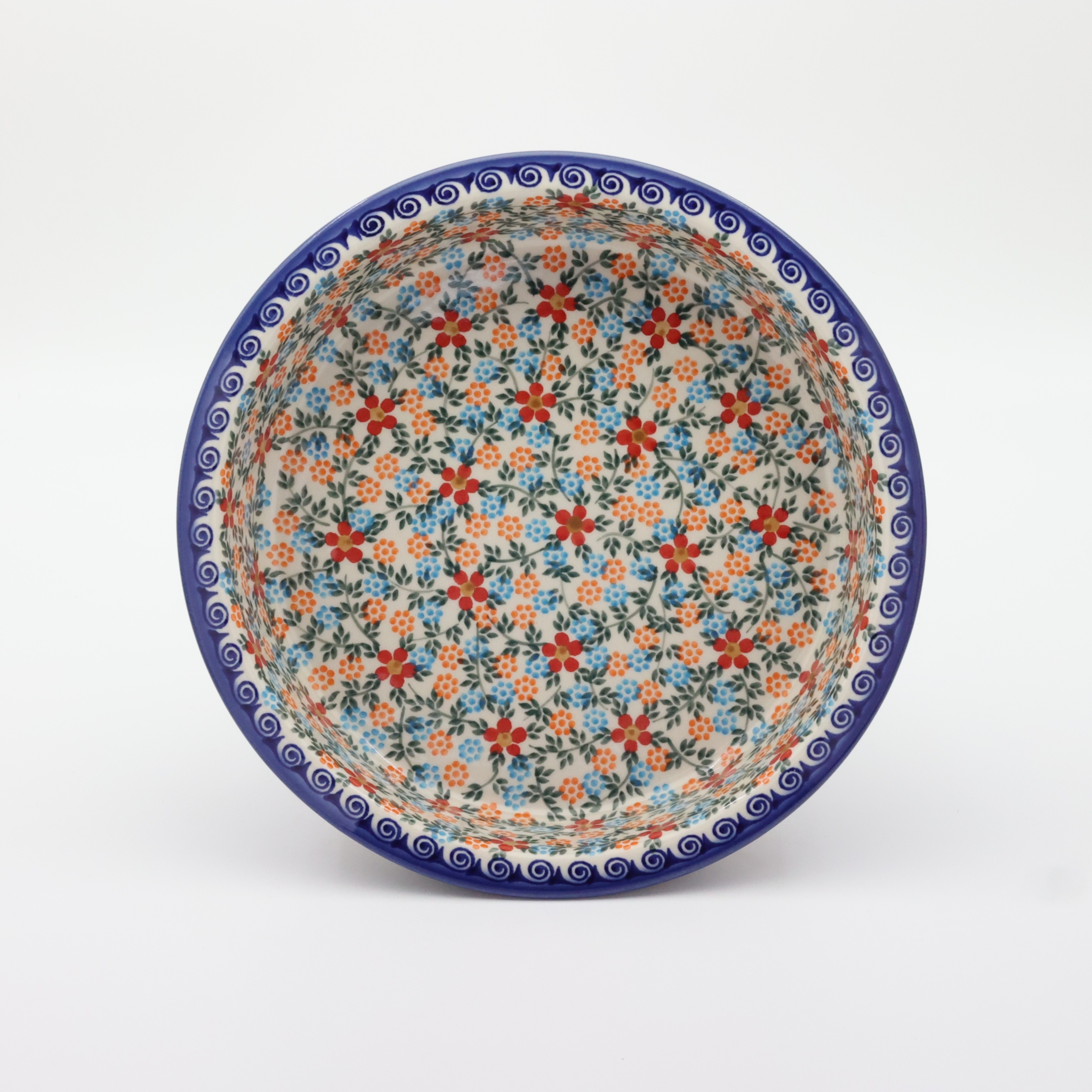 Okrągłe ceramiczne naczynie do zapiekania z Bolesławca, ręcznie zdobiona ceramika bolesławiecka, polskie rękodzieło artystyczne do piekarnika, mikrofalówki i zmywarki.