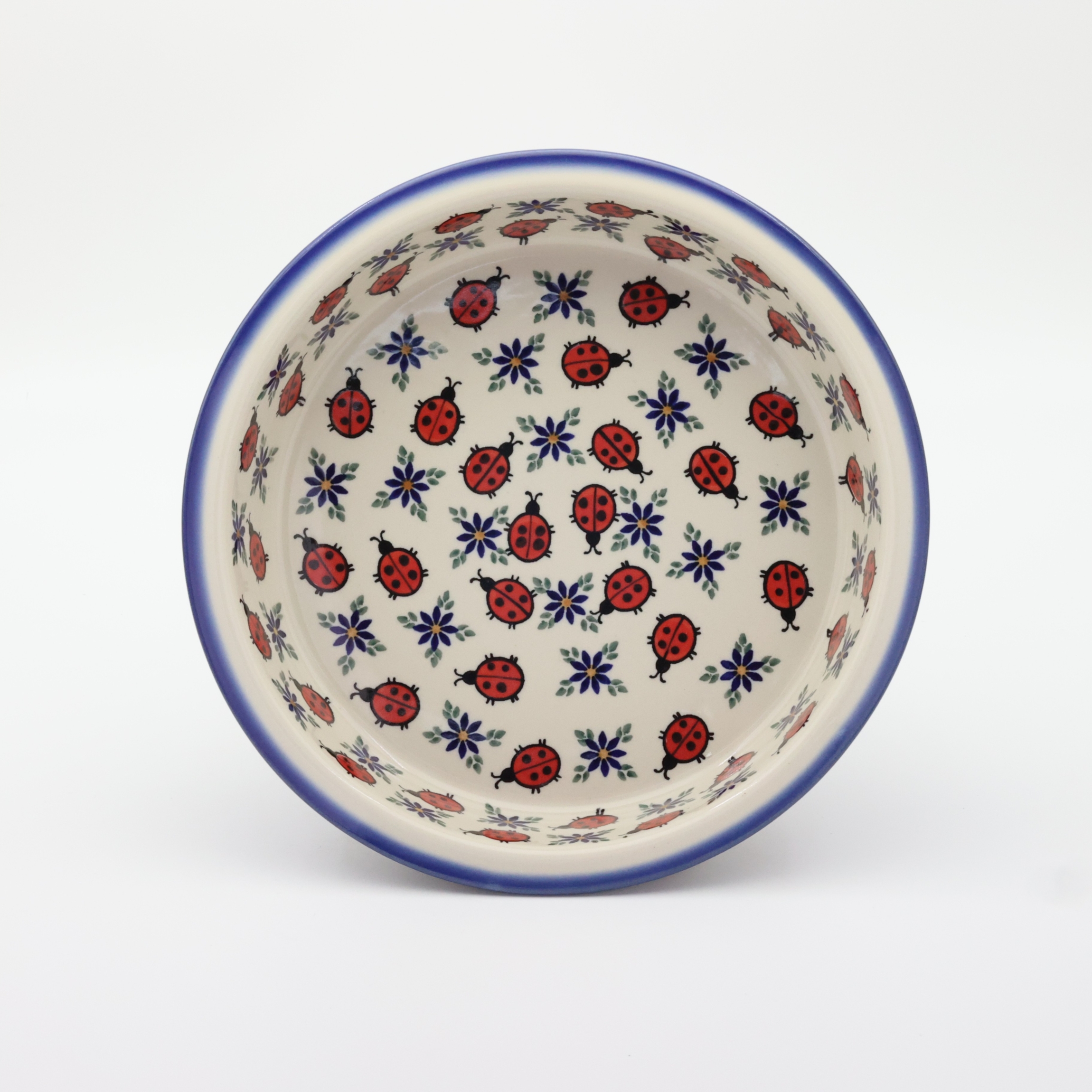 Okrągłe ceramiczne naczynie do zapiekania z Bolesławca, ręcznie zdobiona ceramika bolesławiecka, polskie rękodzieło artystyczne do piekarnika, mikrofalówki i zmywarki.
